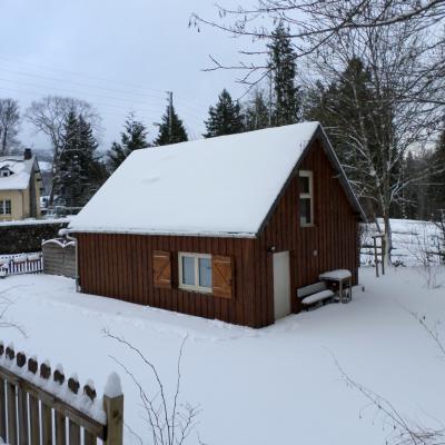 Maison sous la neige